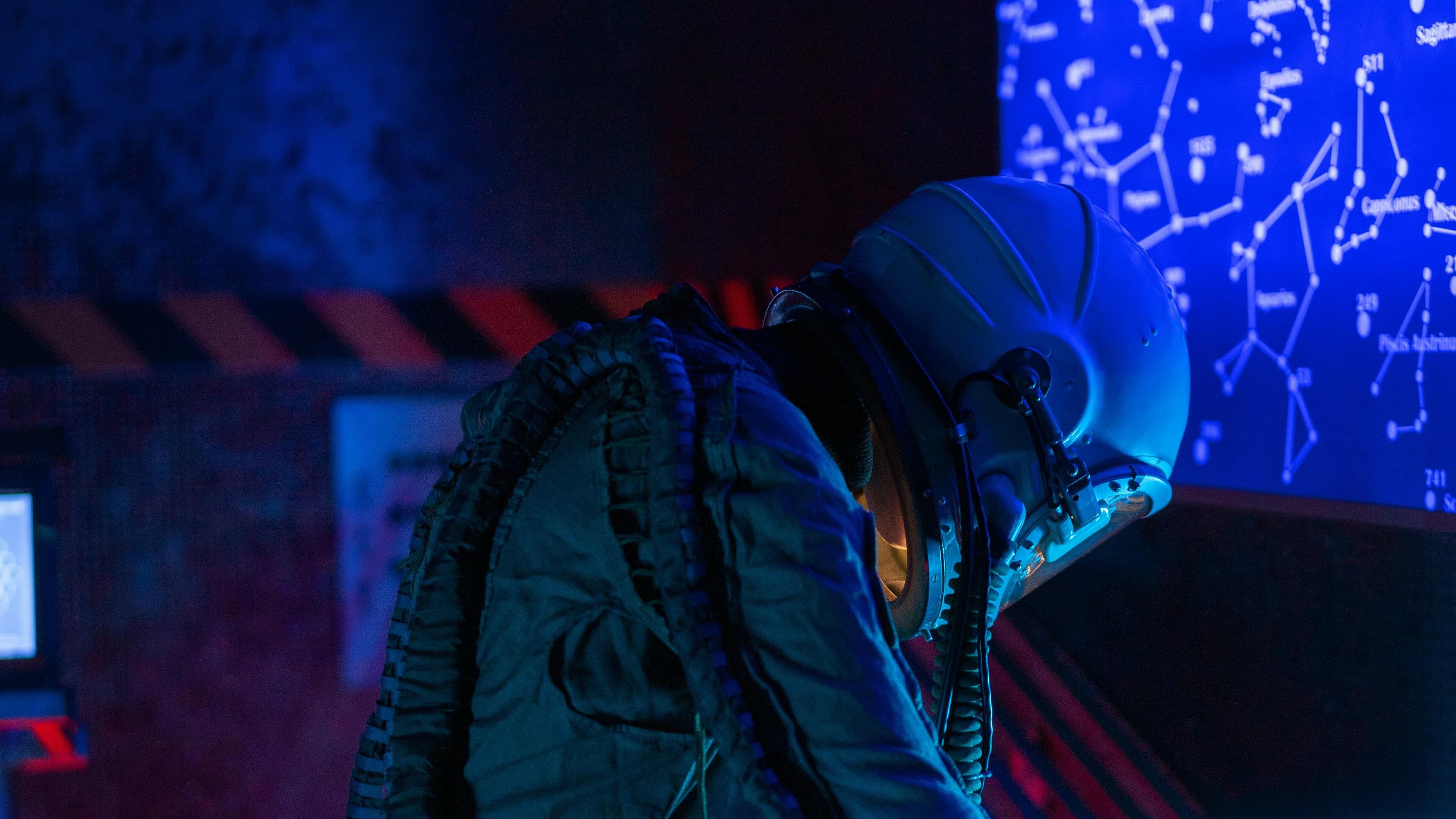 A space man deploying something on a computer